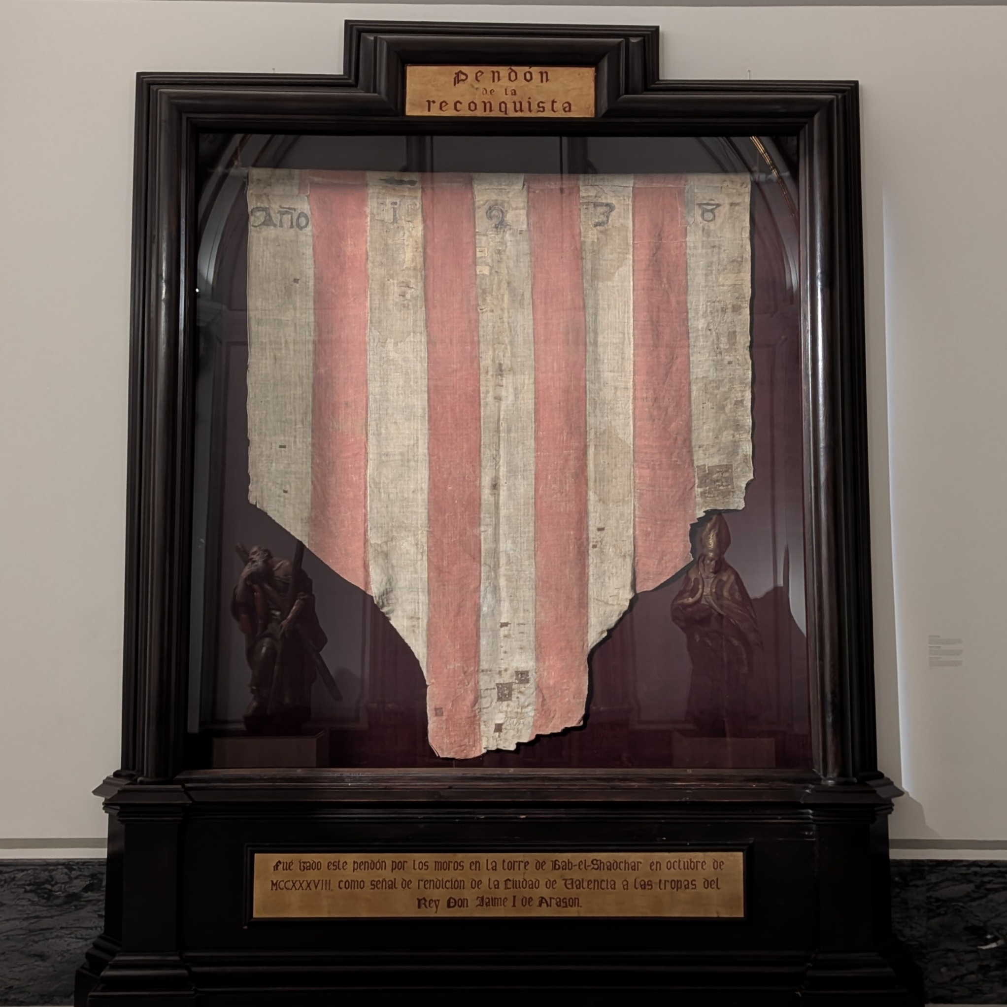 The Pendón de la Conquista, or Banner of the Conquest: the banner that flew above the Bab Ibn-Sajar gatehouse to signal Valencia's surrender to King Jaume I of Aragón.